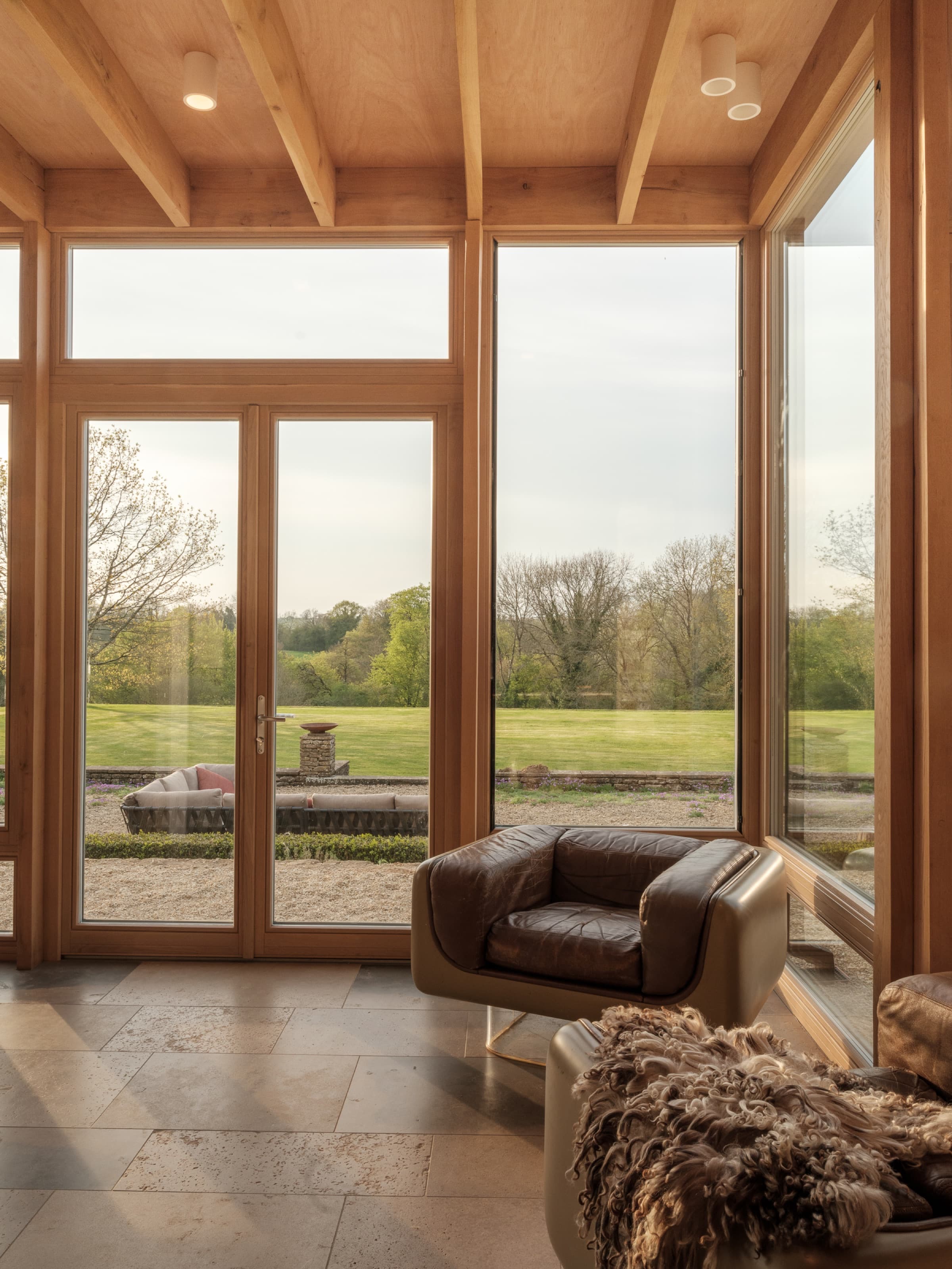 Somerleaze floor-to-ceiling windows over the grounds